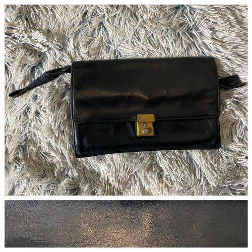 A Vintage Leather Wristlet by Woolworths
