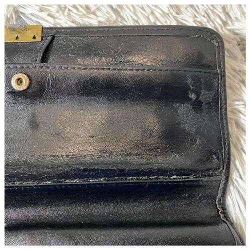 A Vintage Leather Wristlet by Woolworths