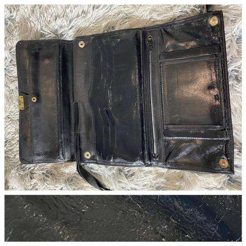 A Vintage Leather Wristlet by Woolworths