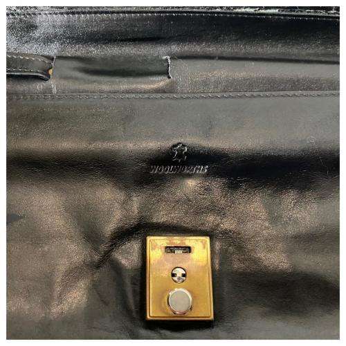 A Vintage Leather Wristlet by Woolworths