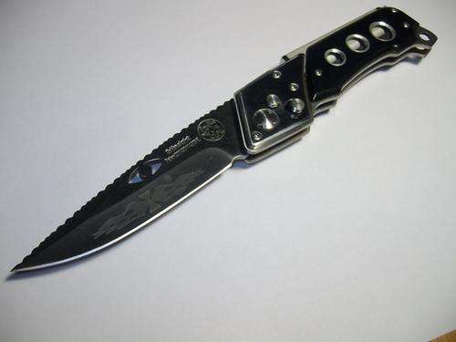 4" Golden Elephant Knife withBuilt-in torch and Cigarette Lighter.