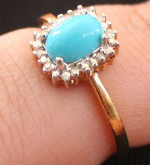 GENUINE TURQUOISE RING FLANKED BY WHITE TOPAZ SET IN 18K GOLD VERMEIL