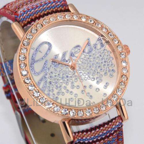 GENEVA FASHION LADIES WATCH WITH CRYSTAL SURROUND AND BLUE CRYSTAL DIAL AND MULTI COLOUR STRAP