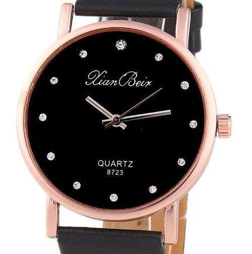 STRIKING WOMAN'S QUARTZ WATCH WITH CRYSTAL DIAL MARKINGS  AND PU LEATHER BAND