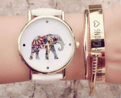 WOMAN'S  ELEPHANT PATTERN DIAL QUARTZ WRISTWATCH WITH WHITE FAUX LEATHER STRAP