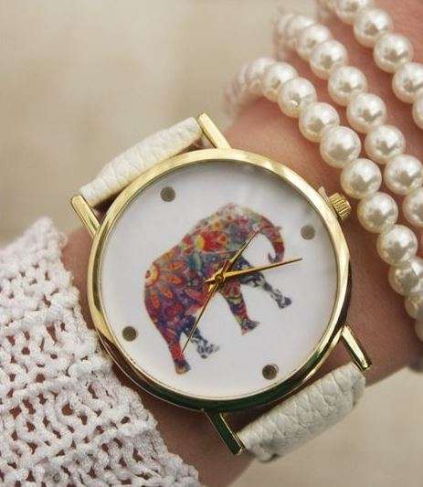 WOMAN'S  ELEPHANT PATTERN DIAL QUARTZ WRISTWATCH WITH WHITE FAUX LEATHER STRAP