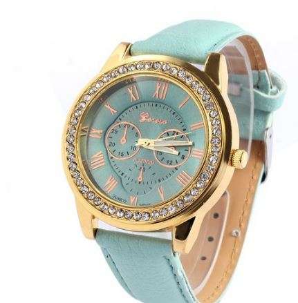 GENEVA  WOMANS SKY BLUE ROMAN NUMERALS WITH CRYSTALS SURROUNDING  DIAL WATCH WITH FAUX LEATHER STRAP