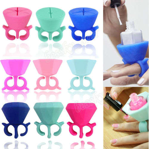 BLUE NAIL POLISH BOTTLE HOLDER - FITS ON YOUR FINGER TO PREVENT SPILLING AND SMUDGING