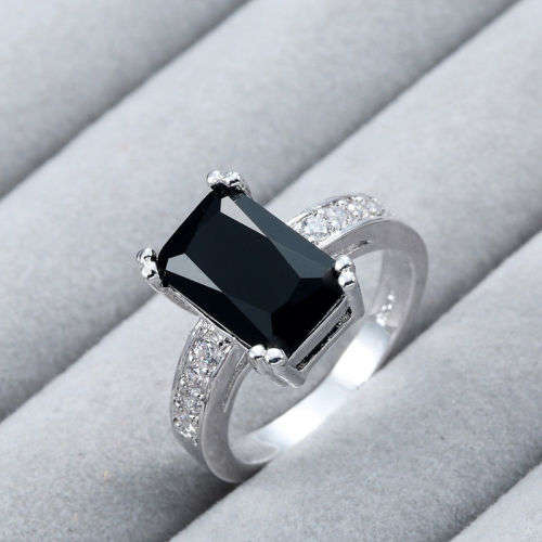 BLACK ONYX AND WHITE TOPAZ CZ ACCENT STONES IN  SILVER PLATED RING - SIZE 10 (U)