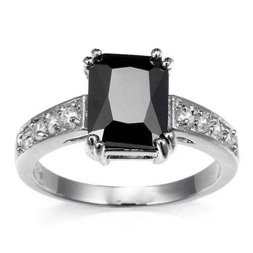 BLACK ONYX AND WHITE TOPAZ CZ ACCENT STONES IN  SILVER PLATED RING - SIZE 10 (U)