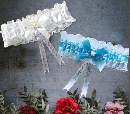 BRIDE`S  SATIN GARTER IN BLUE WITH BLUE SATIN BOW AND WHITE LACE EDGING