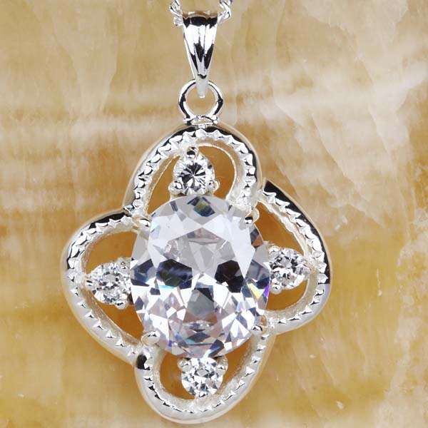 "FREE CHAIN" OVAL WHITE TOPAZ CZ CRAFTED IN A STERLING SILVER PENDANT
