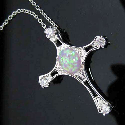 SIMULATED PINK OPAL SET IN CROSS PENDANT CRAFTED FROM HALLMARKED .925 SILVER