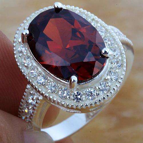 OVAL RUBY & WHITE CZ RING - SIZE 8
