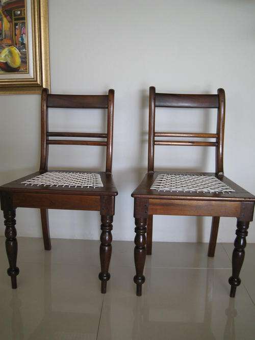 AFRICANA PAIR VICTORIAN CAPE RIEMPIES CHAIRS: PART OF FAMILY MORE THAN 100 YEARS