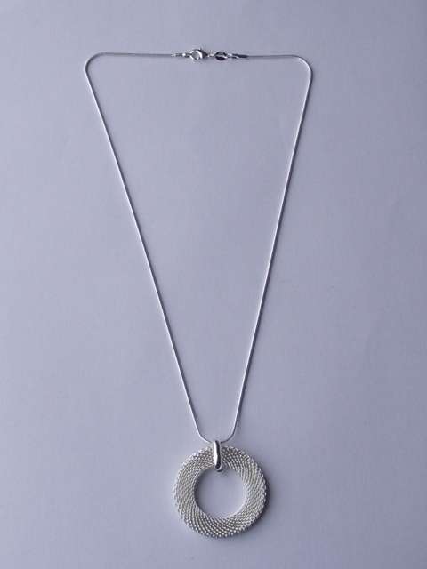 MAGNIFICENT STERLING SILVER CHAIN AND A ROUND STERLING SILVER PENDANT