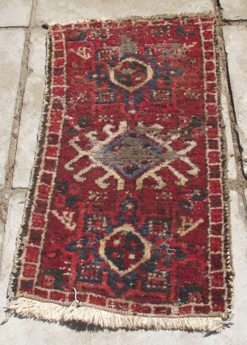 WELL WORN PERSIAN RUG