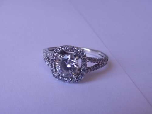 LOVELY STERLING SILVER AND MULTIPLE CZ RING