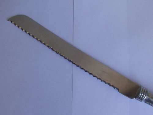 STUNNING CARROL BOYES BREAD KNIFE