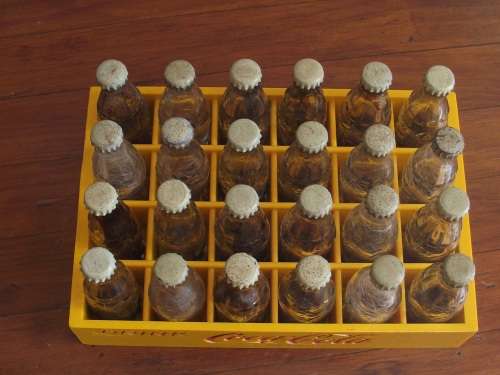 Vintage miniature Coca Cola crate with 24 mini bottles