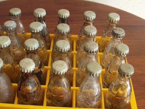 Vintage miniature Coca Cola crate with 24 mini bottles