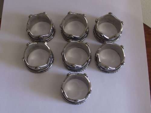 7 x PEWTER NAPKIN RINGS