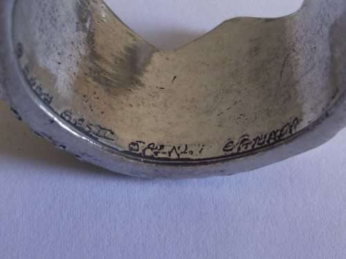 7 x PEWTER NAPKIN RINGS