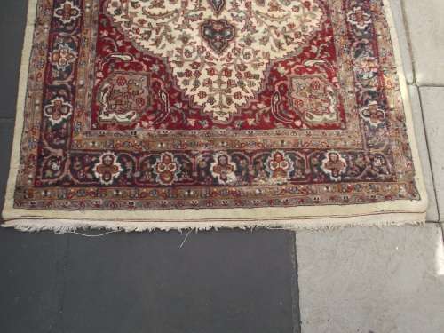 HAND WOVEN PERSIAN CARPET HAS AGE RELATED WEAR