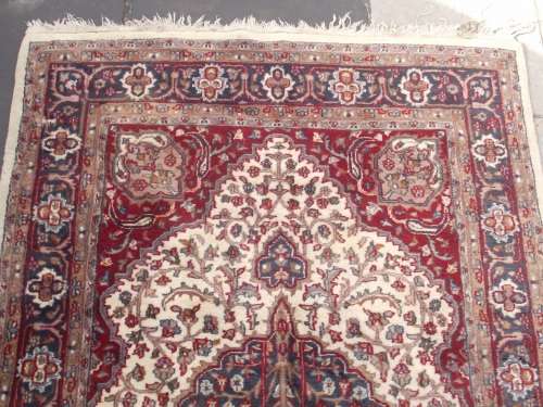 HAND WOVEN PERSIAN CARPET HAS AGE RELATED WEAR