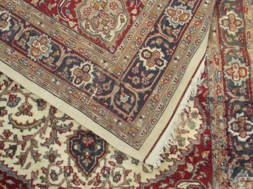 HAND WOVEN PERSIAN CARPET HAS AGE RELATED WEAR