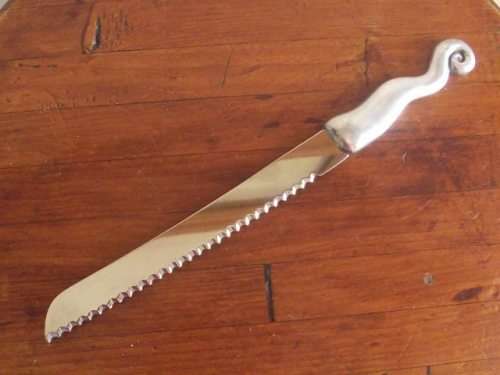 GORGEOUS CARROL BOYES BREAD KNIFE-WAVE