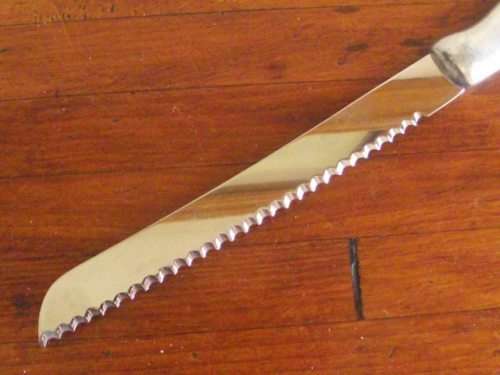 GORGEOUS CARROL BOYES BREAD KNIFE-WAVE