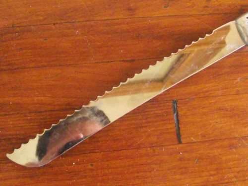 GORGEOUS CARROL BOYES BREAD KNIFE-WAVE