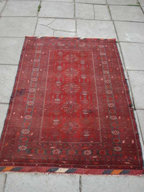 HAND WOVEN PERSIAN RUG --- HAS SOME BALDING AND DAMAGE