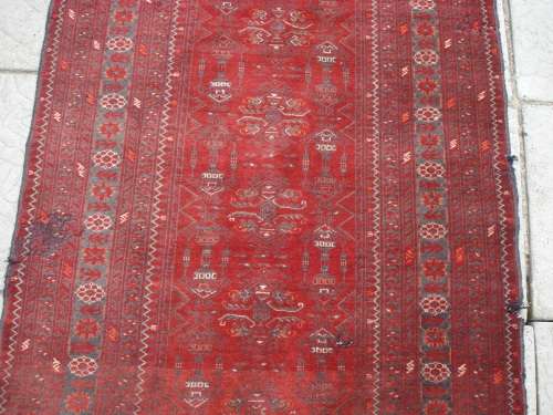 HAND WOVEN PERSIAN RUG --- HAS SOME BALDING AND DAMAGE