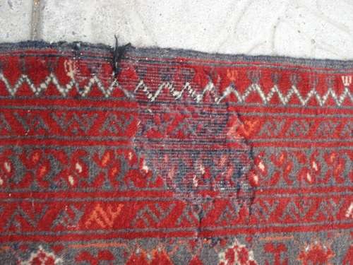 HAND WOVEN PERSIAN RUG --- HAS SOME BALDING AND DAMAGE