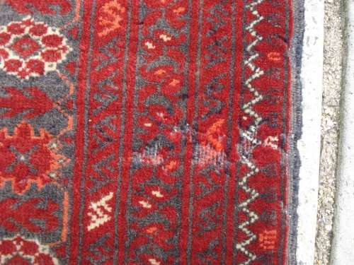 HAND WOVEN PERSIAN RUG --- HAS SOME BALDING AND DAMAGE