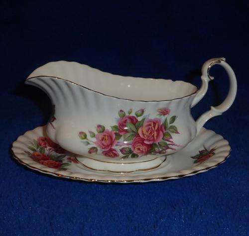 ROYAL ALBERT "Centennial Rose" Gravy Boat (with chip) on Saucer