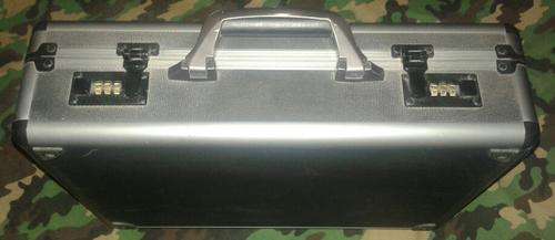 Alluminium Briefcase very good condition. Combination locks.