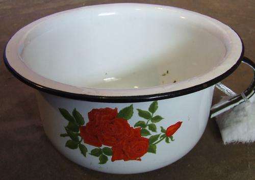 white enamel potty with flower