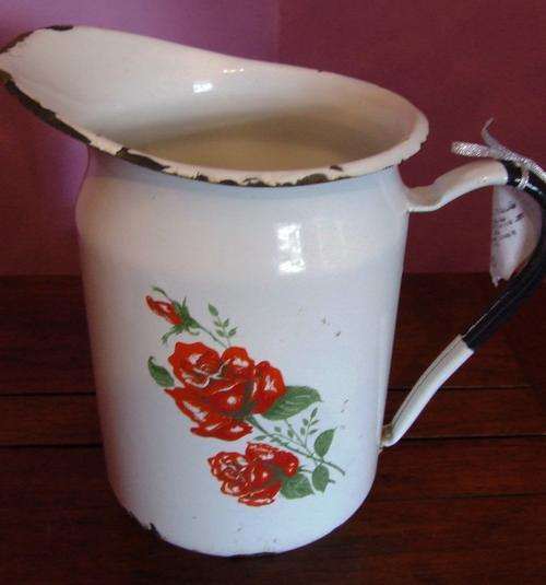 white Enamel Jug with flower detail