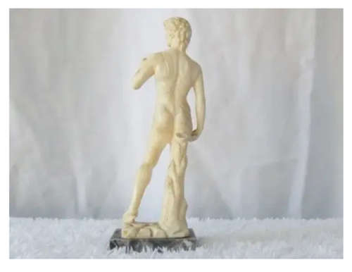 THE SMALLEST RESIN DAVID STATUE BY A.SANTINI OF ITALY ON A MARBLE LOOK BASE