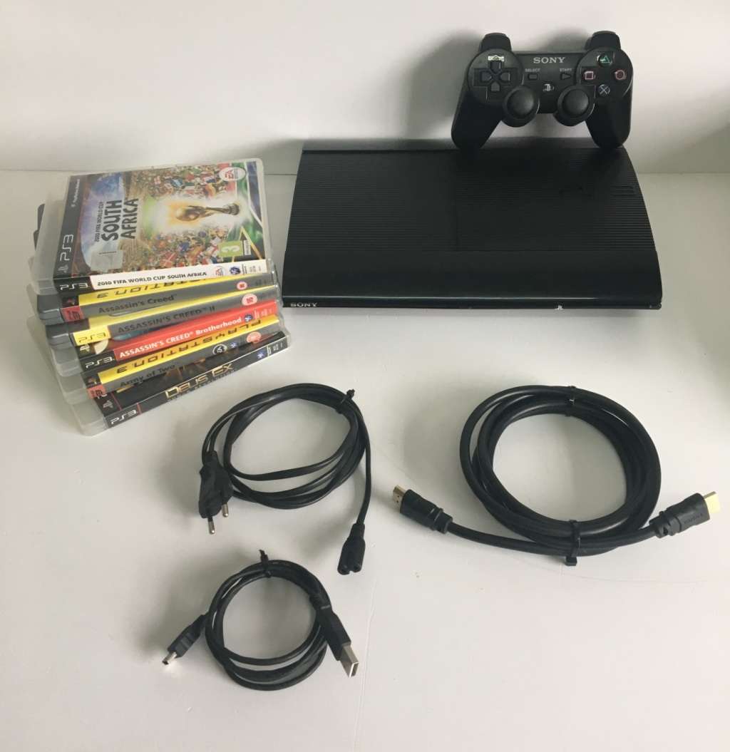 PlayStation 3 Super Slim 1TB + Controller And 6 Titles Good Condition! ( Original Box Not Included )