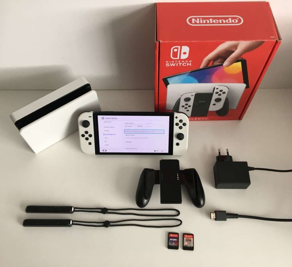 Nintendo Switch OLED Model White 64GB With White Joy-Con Controllers And 2 Titles Great Condition!