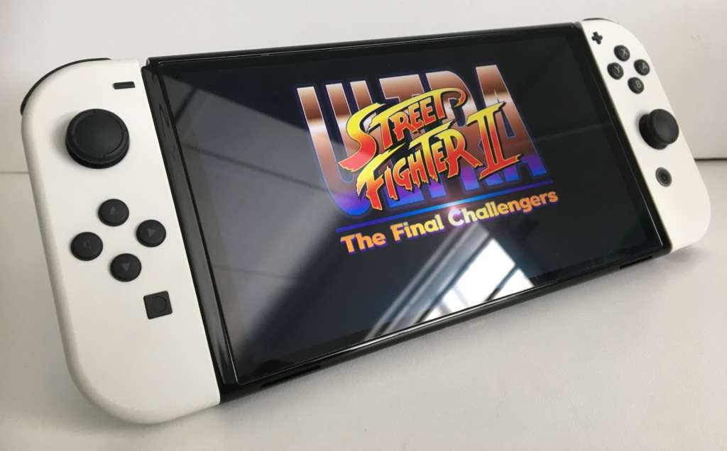 Nintendo Switch OLED Model White 64GB With White Joy-Con Controllers And 2 Titles Great Condition!