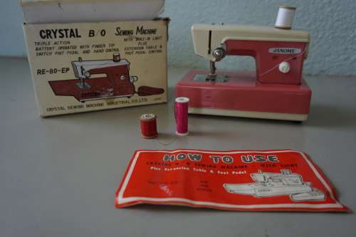 Vintage Japanese metal Crystal Sewing Machine (toy in box)