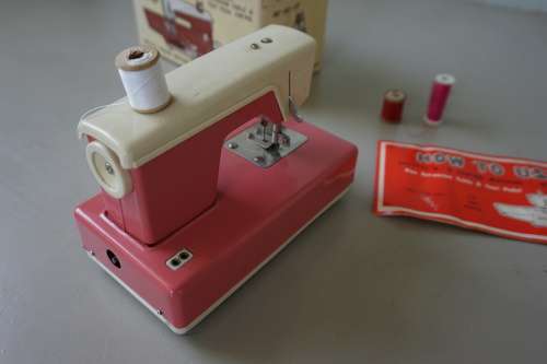 Vintage Japanese metal Crystal Sewing Machine (toy in box)