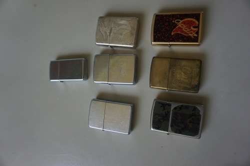 JOBLOT OF 7 ZIPPOs with spares