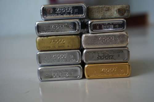 JOBLOT OF 7 ZIPPOs with spares