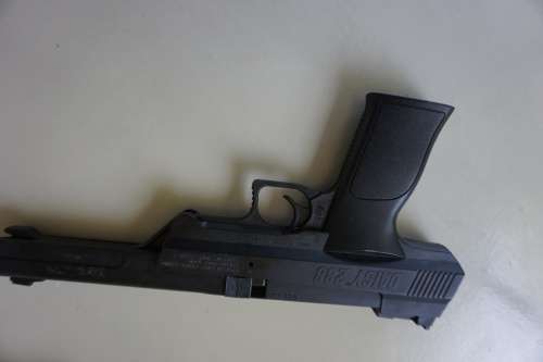 Vintage Daisy air pistol with toy rifle scope?